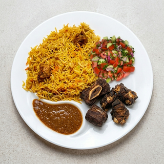 Pilau With Dry Fry Goat, Kachumbari & Ukwaju Sauce