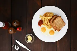 Two Eggs and Toast with Chips