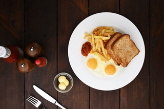Two Eggs and Toast with Chips