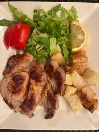 Lombata di maiale con patate al forno