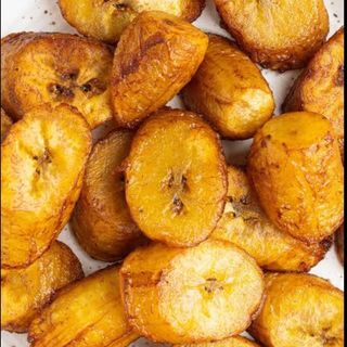 Stir Fry Noodles, Sausage Plantains and fried Eggs