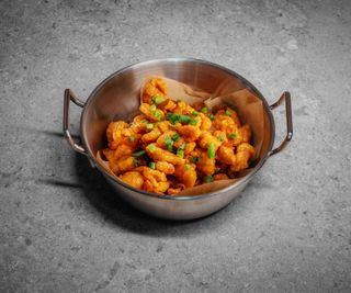 ქათმის პოპქორნი სპაის სოუსით