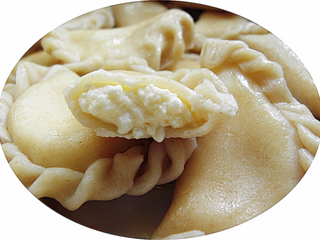 Pierogi z twarogiem i śmietaną 7 szt.