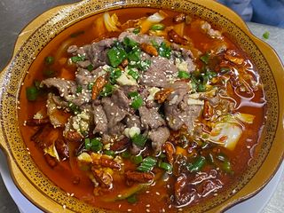 Ternera con sopa picante