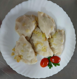 Pierogi z kapustą i grzybami   5 szt