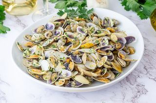 Tapa de tellinas salteadas con ajo (200 g.)