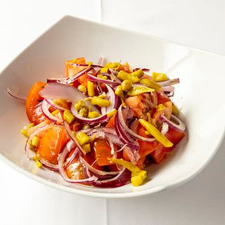 Tomate de temporada aliñado