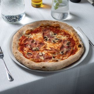 Prosciutto e funghi