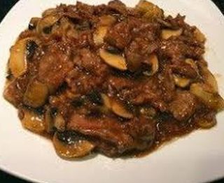 Ternera Con Champiñones