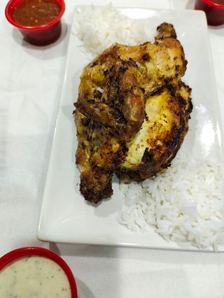 1/2 Pollo A L'Ast Con Arroz Y Ensalada Especial