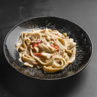 Tagliatelle prosciutto cherry