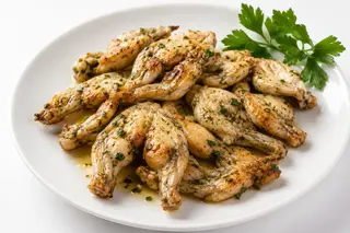 Cuisses De Grenouilles Sautées À L’ail