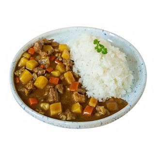 17C. Ternera Al Curry Sobre Arroz Blanco