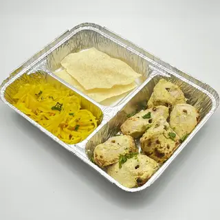 Malai tikka con contorno