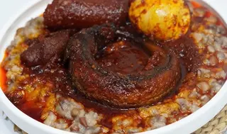 Ewa Agoyin With Fish, Egg And Plantain