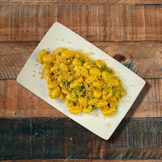 Gnocchi di patata con broccoli, 'nduja e polvere di parmigiano tostato