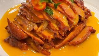 Pato Con Salsa De Naranja