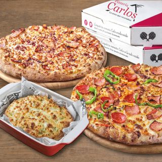 2 Pizzas Medianas + Pan de Ajo
