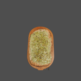 Pinsa senza glutine con crema al pistacchio e granella di pistacchio 