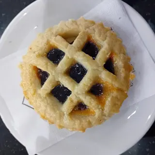 Crostatina tonda scura marmellata ciliegia