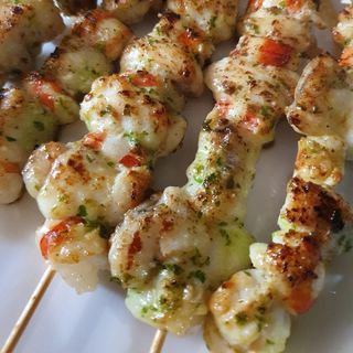60. Brocheta de rape e langostino