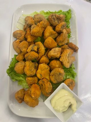 Champiñones empanados