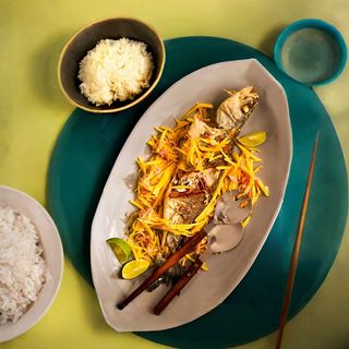 Fried Fish With Shredded Pieces Of Mango And Mint Salad