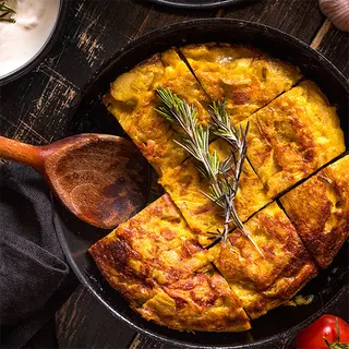 Tortilla De Patatas Con Gulas Y Langostinos