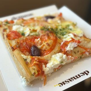 Focaccia tomate y ricotta