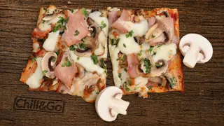 Pizza Prosciutto Cotto e Funghi - o porție