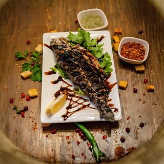 კალმახი შემწვარი მაყალზე