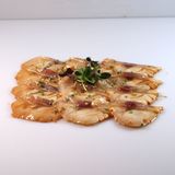 Carpaccio flambe di Branzino