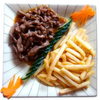 Ternera Con Patatas Fritas