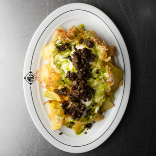 103 Ous de Calaf fregits amb patates i botifarra de Perol