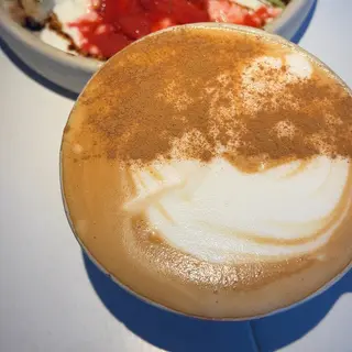 Latte with cinnamon bun