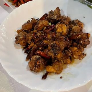 Pollo con salsa picante