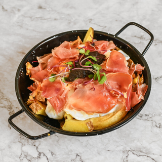 Huevos estrellados con jamón trufados