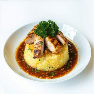 Mofongo De Pechuga A La Parrilla En Salsa