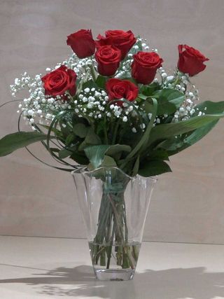 7 Rose rosse