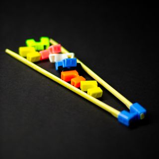 Pomocnik do pałeczek