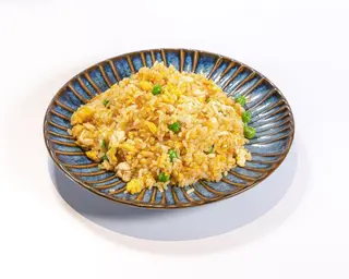 Riso con pollo, curry e verdure