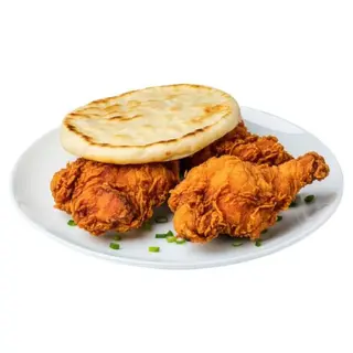 Pollo frito con Arepa