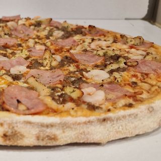 Pizza al gusto hasta 5 ing (Familiar)