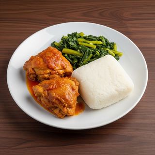 Chicken pcs with ugali & greens