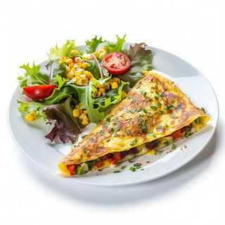 Plato de tortilla española con ensalada