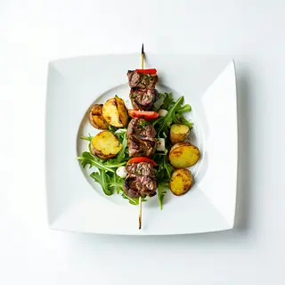 Plato Pinchos De Cordero
