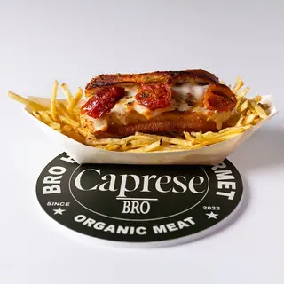 Hot Dog de cerdo con capresse y tomate cherry