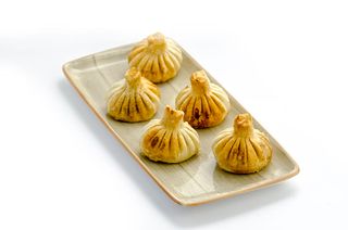 მთიულური ხინკალი შემწვარი კარაქში (10ც)