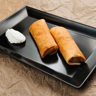 Pancakes with meat and sour cream