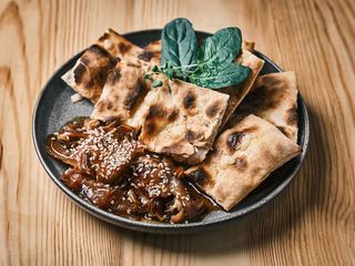 Вуха копчені в соусі (100g)